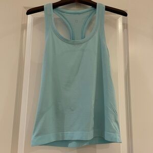 Lululemon Swiftly Tech Racerback Hip Length. Size 6